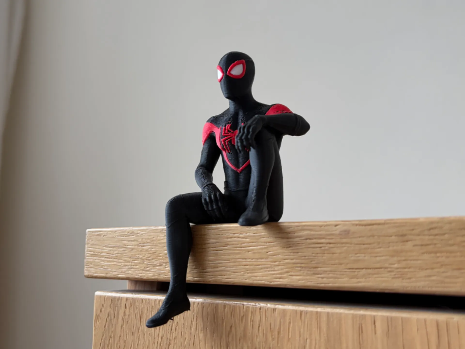 Spider Man sitting shelf figure